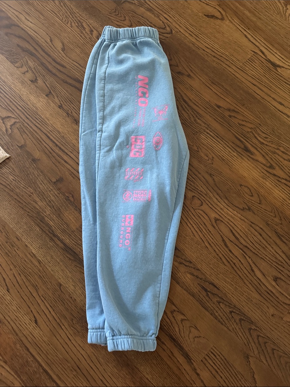 Light Blue Kids Joggers with Pink Graphic Logo